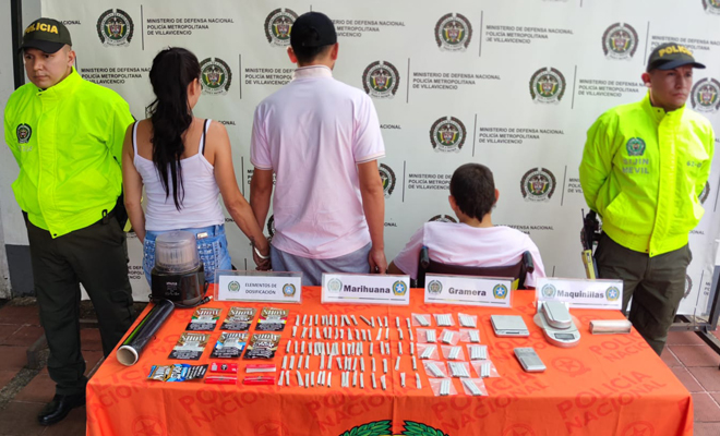 Persona capturada-policías custodiando 