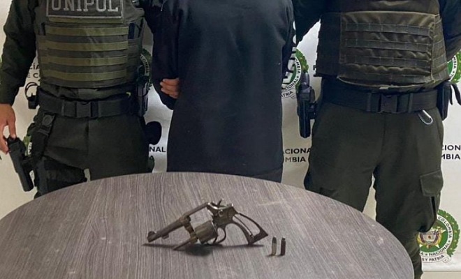 capturado con arma de fuego