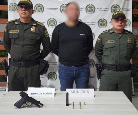 capturado con arma de fuego