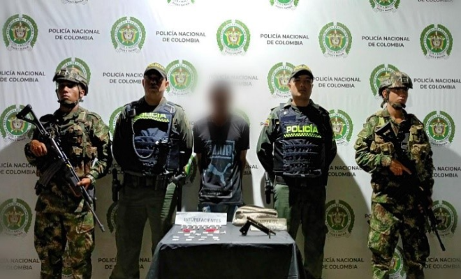 hombre-capturado-con-arma-de-fuego